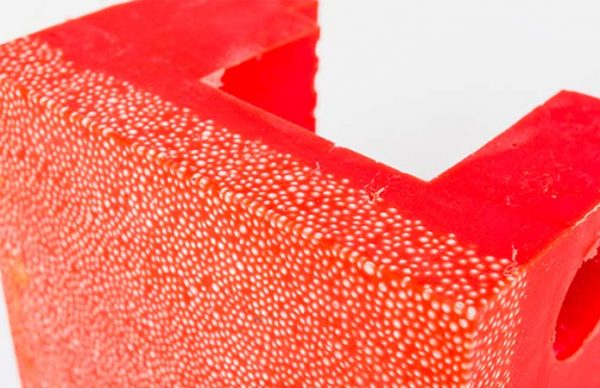 Detail of red polyurethane classifier shoes