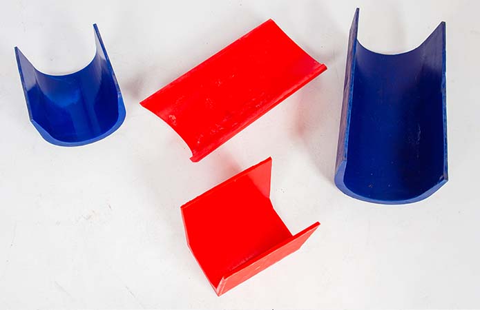Example of red and blue urethane launders and chute liners for mining