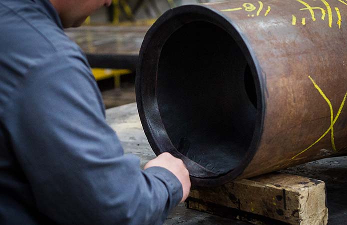 Selecting the Best Rubber Lining for Your Pipe System - Iracore